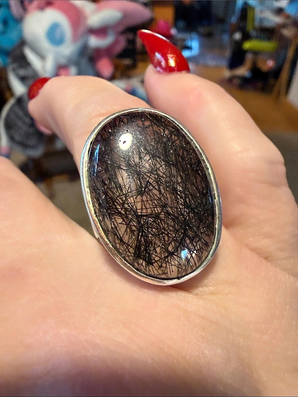 Oval black rutilized quartz also known as tourmalated quartz rare Stone Statemen